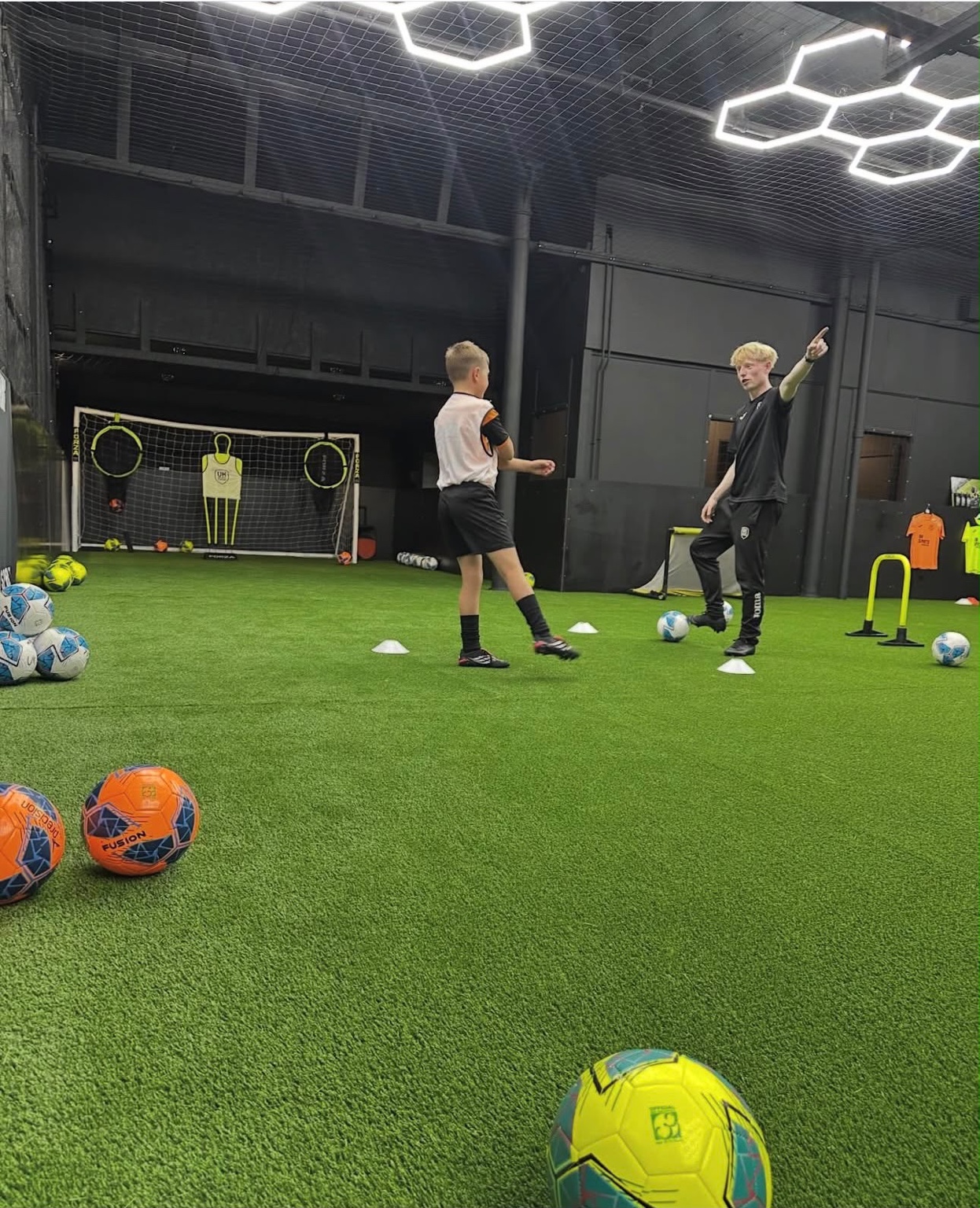 One to one football coaching session at the UK Sports Arena